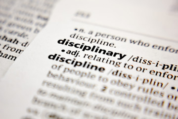Word or phrase disciplinary in a dictionary.