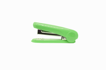 Green stapler isolated on a white background with clipping path.