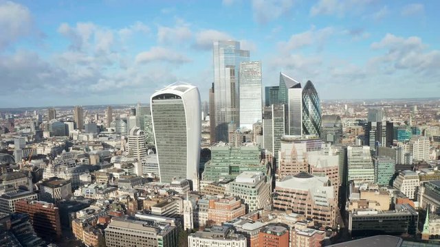 London city centre aerial panorama view: financial district, Thames river, Belfast, skyscrappers, warf and buildings and St. Pauls Cathedral, Tower Bridge and The Tower