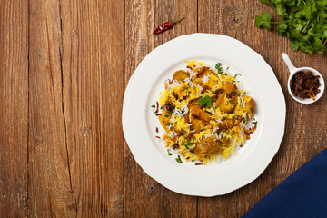 Biryani with chicken. Traditional Indian dish of rice and chicken marinated in spices and yoghurt.