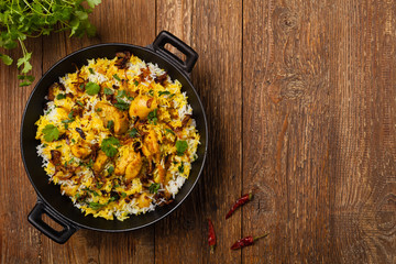 Biryani with chicken. Traditional Indian dish of rice and chicken marinated in spices and yoghurt.