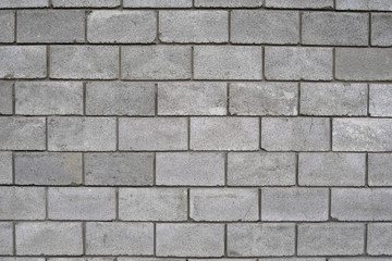 Fototapeta premium Lightweight concrete block foamed texture. Background texture of white Lightweight Concrete block, raw material for industrial or house wall.
