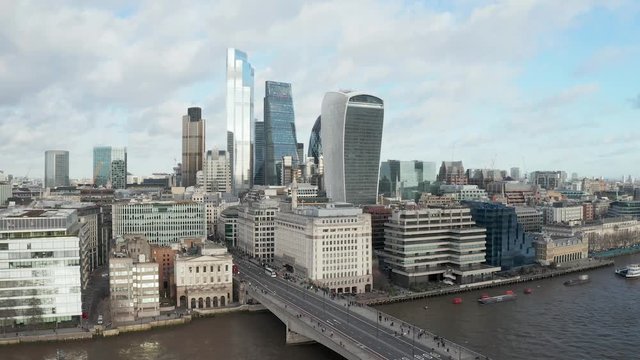 London city centre aerial panorama view: financial district, Thames river, Belfast, skyscrappers, warf and buildings and St. Pauls Cathedral, Tower Bridge and The Tower