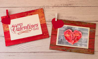 Holiday background for Valentine's Day on a white wooden background in retro style. Frame for congratulation text.