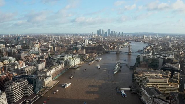 London city centre aerial panorama view: financial district, Thames river, Belfast, skyscrappers, warf and buildings and St. Pauls Cathedral, Tower Bridge and The Tower