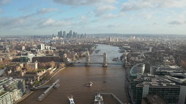 London city centre aerial panorama view: financial district, Thames river, Belfast, skyscrappers, warf and buildings and St. Pauls Cathedral, Tower Bridge and The Tower