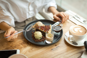 .breakfast in a cafe with porridge and delicious desserts