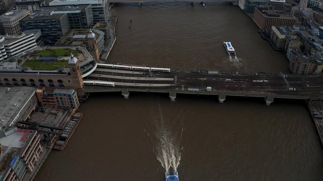London city centre aerial panorama view: financial district, Thames river, Belfast, skyscrappers, warf and buildings and St. Pauls Cathedral, Tower Bridge and The Tower