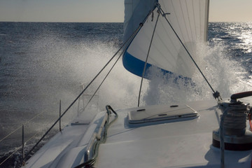 Sailing in strong winds and stormy seas.
