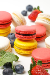colorful macaroons on white background
