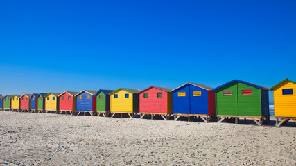 Fototapeta premium beach huts on the beach by muizenberg