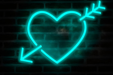 Neon heart on a brick wall