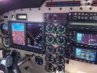 Dashboard view of a modern aircraft during flight