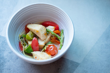 Thai salad Vietnamese pork sausage with salted egg in a bowl