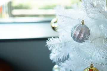 Silver color ball decorated on Christmas tree