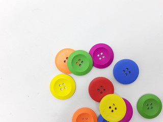 Various Bright Colorful Handmade Cute Shirt Button for Tailor Clothing Accessories in White Isolated Background 