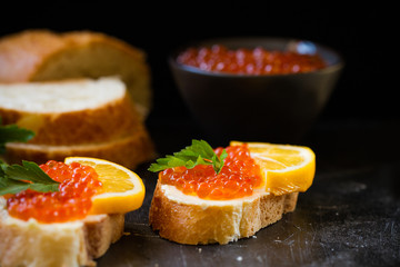 Red caviar sandwich with butter.
