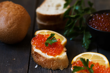 Red caviar sandwich with butter.