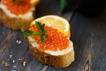Red caviar sandwich with butter.