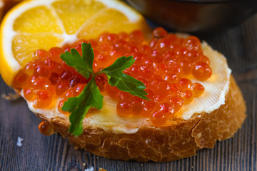 Red caviar sandwich with butter.