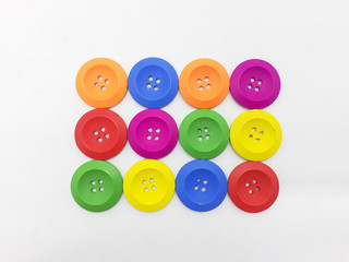 Various Bright Colorful Handmade Cute Shirt Button for Tailor Clothing Accessories in White Isolated Background 