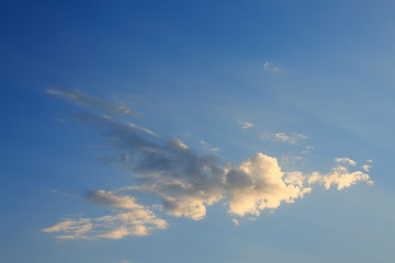 Fototapeta na wymiar sun light shine through cloud on clear blue sky background