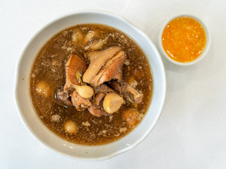 Braised pork leg in Chinese medicine soup