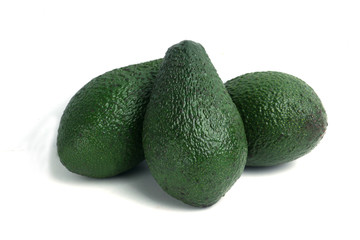 three avocado isolated on white background. Horizontal image