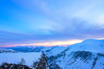 Sunset in the snow-covered mountains of Gudauri. Georgia