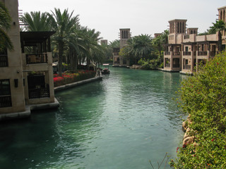 view of canals of Souk Madinat Jumeirah at sunny day, Dubai, UAE