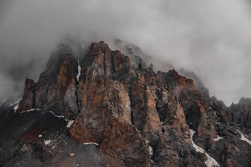 View at the cliff covered in fog