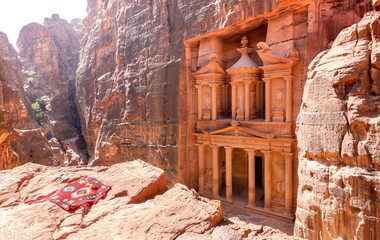 High angle panorama view of Treasury Temple in Petra after sunrise - World heritage site from the Nabatean Kingdom in Jordan - Travel and wanderlust concept on Middel East Asia wonders