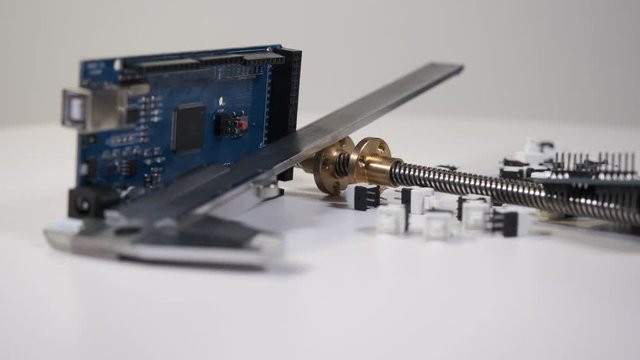 Prototyping board, vernier caliper and lead screw with scattered push-button switches rotate 360 ​​degrees
