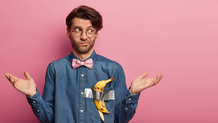 Unaware male takes part in popular flash mob with taped most expensive peeled and eaten banana,...