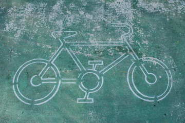 Old green bicycle path made of cement