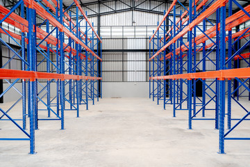 Fototapeta na wymiar New Large Scale Distribution Warehouse with High Empty Shelves.