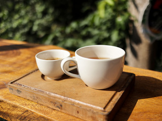 cup of coffee on wooden table
