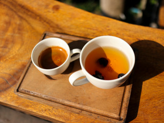 cup of coffee on wooden table. Bael Fruit Juice