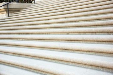 A closeup view of a vintage concrete staircase.