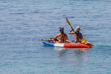Tourists canoeing on the beautiful sea around Lipe Island, Satun, Thailand