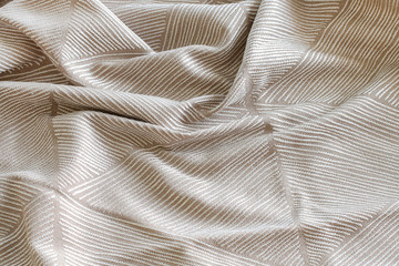 Soft beige fabric. Fashion background.