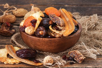 Mix from dried fruits in bowl. Healthy food. Symbols of judaic holiday Tu Bishvat