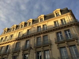 Fototapeta na wymiar Sunset over Dijon's old town buildings