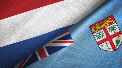 Netherlands and Fiji two flags textile cloth, fabric texture