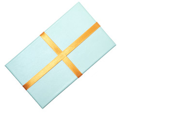 Fototapeta na wymiar Blue box with orange ribbons. Copy space. Place for text and design. Copy space.Place for text and design