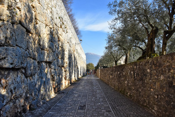The cyclopean walls of an ancient acropolis in an Italian town