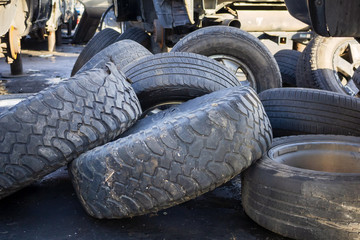 Obraz premium A view of several used tires in a pile.