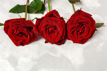 Composition of red roses and gift boxes