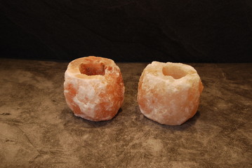 Himalyan Salt Lamps from side with dark natural background
