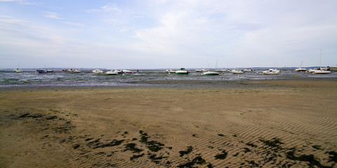 low tide beach of Andernos in France in web banner template